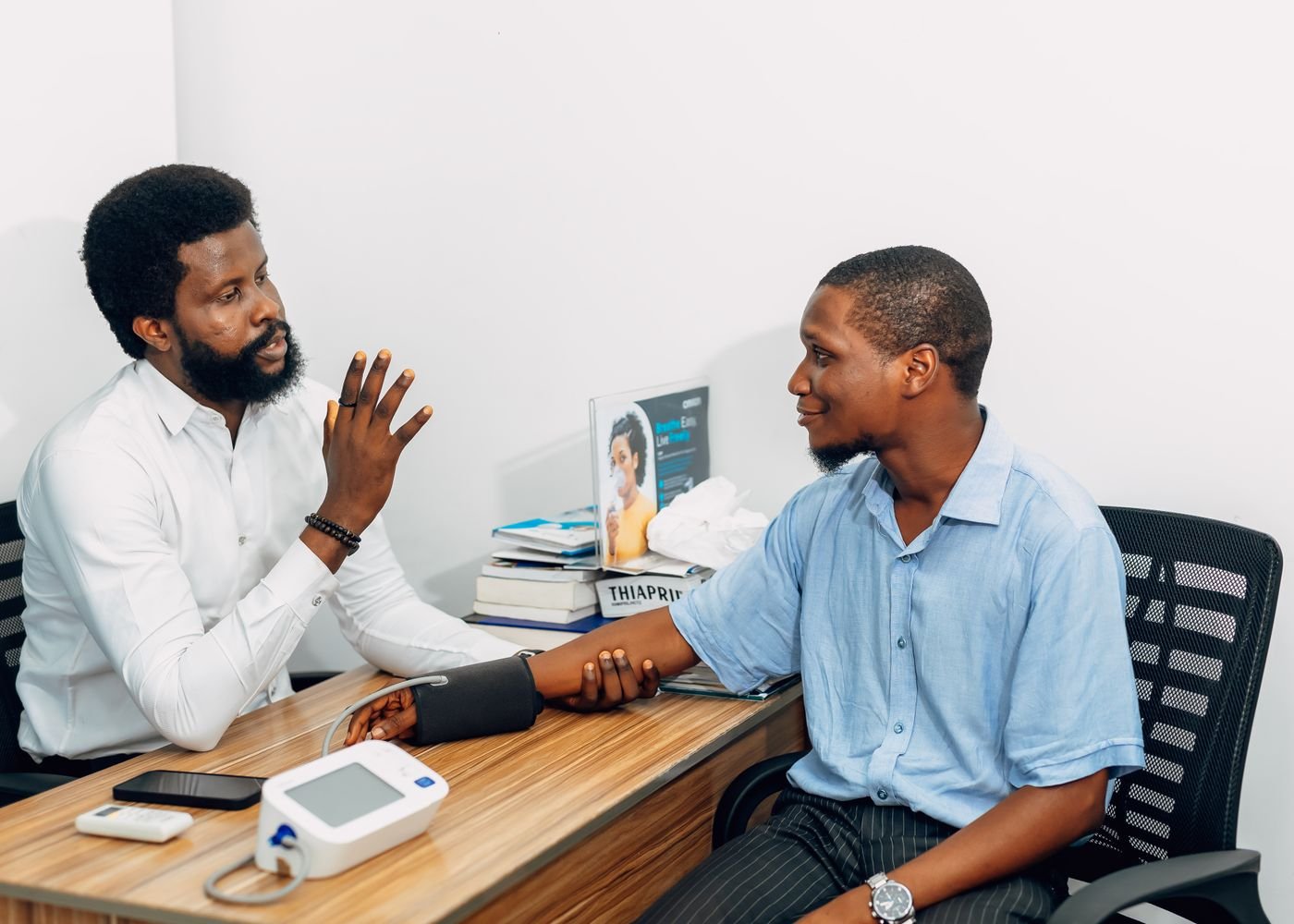 Employer wellness consultation between a healthcare professional and an employee