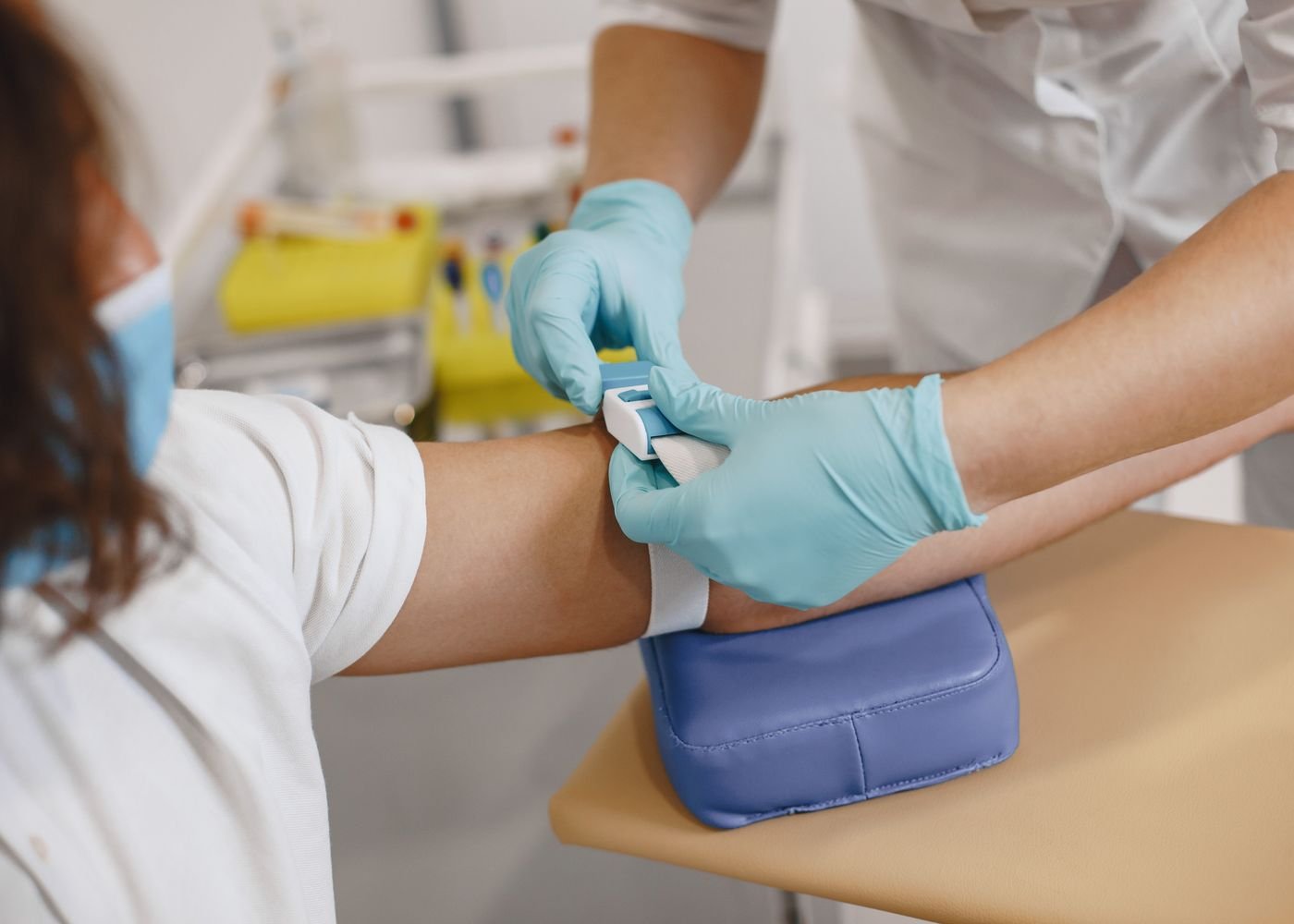 Laboratory professional labeling a specimen sample in a calm clinical setting